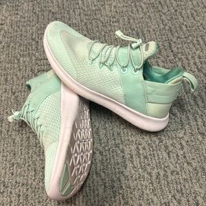 Teal Nike sneakers